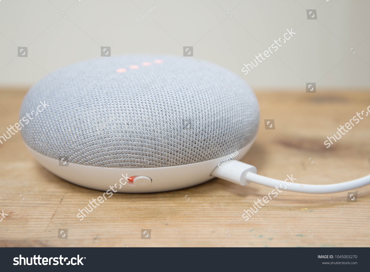 google home mini microphone switch