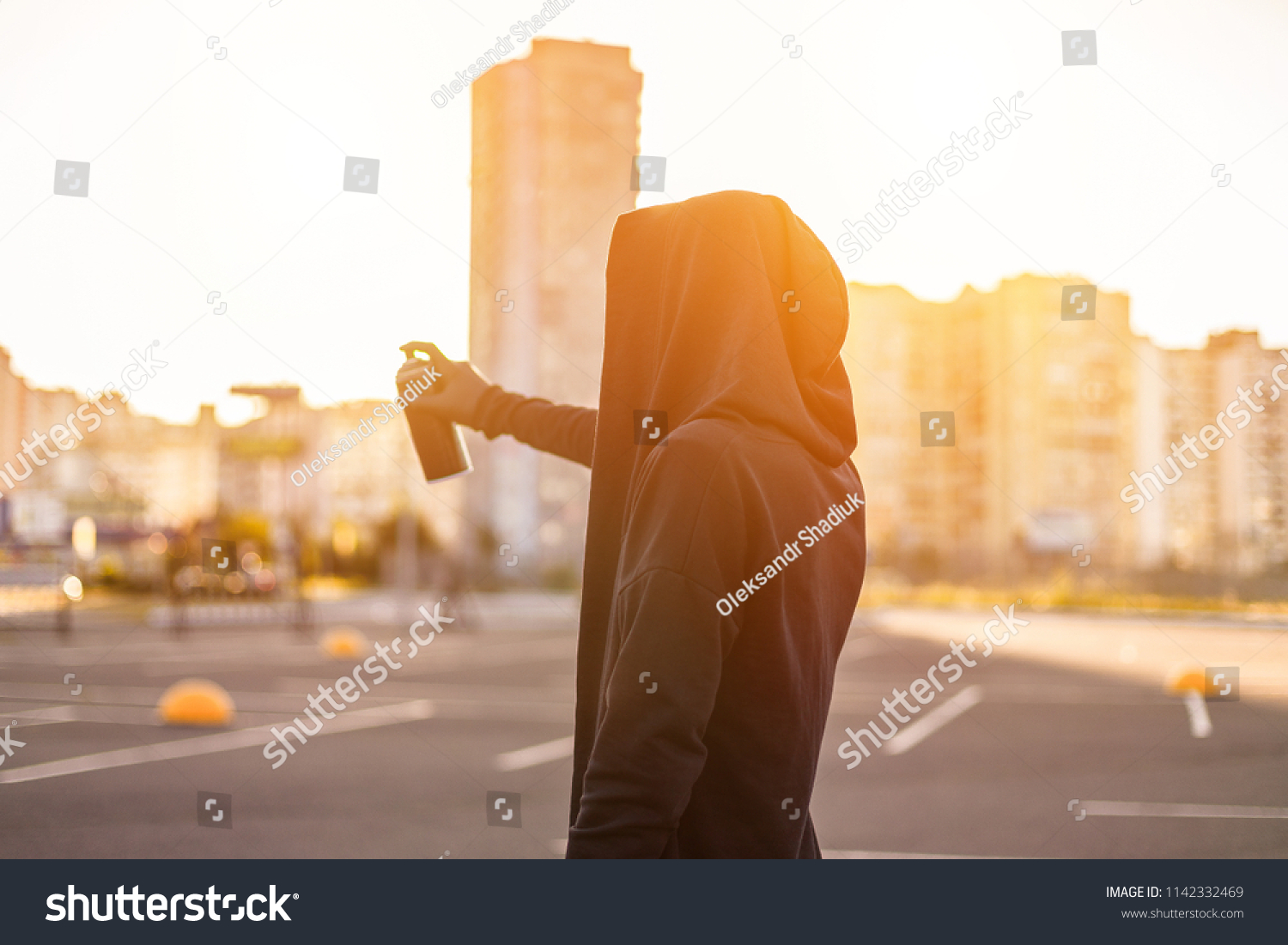 Hooded Man Mask Drawing Graffiti By Stock Photo 1142332469 Shutterstock