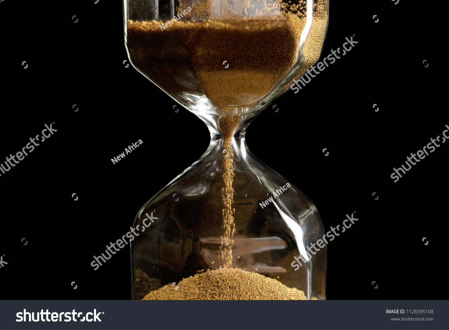 Hourglass Flowing Sand On Dark Background Stock Photo 1126595108 ...