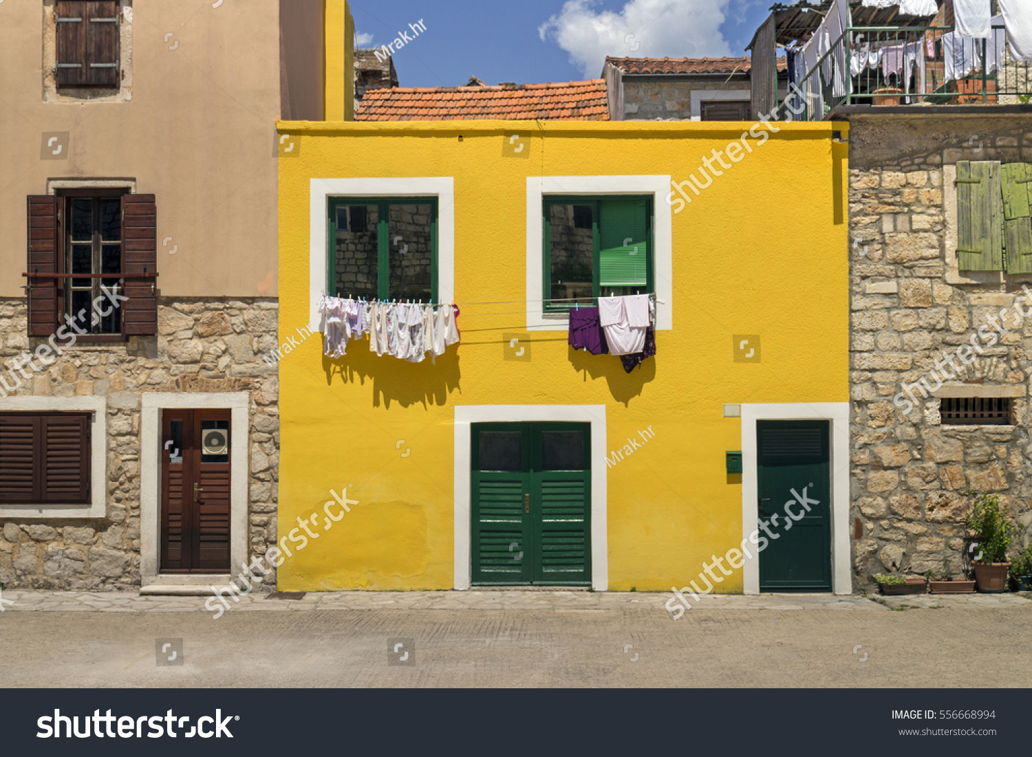House Yellow Facade Green Windows Door Stock Photo Edit Now