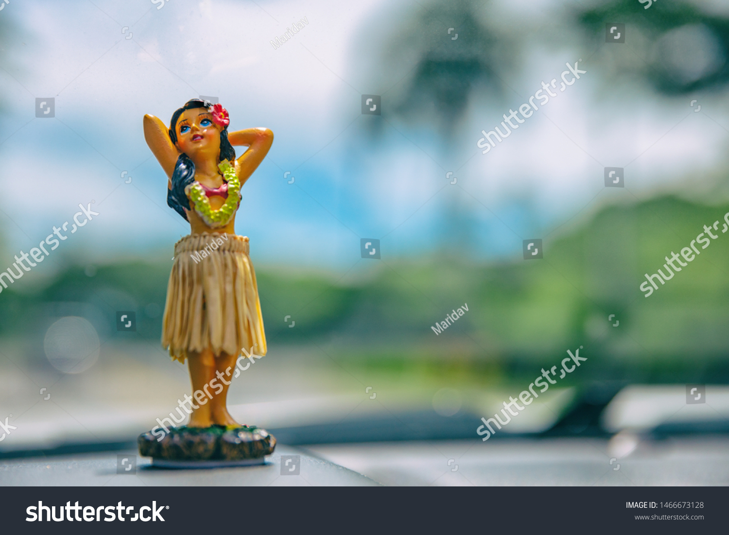 dancing doll car dashboard