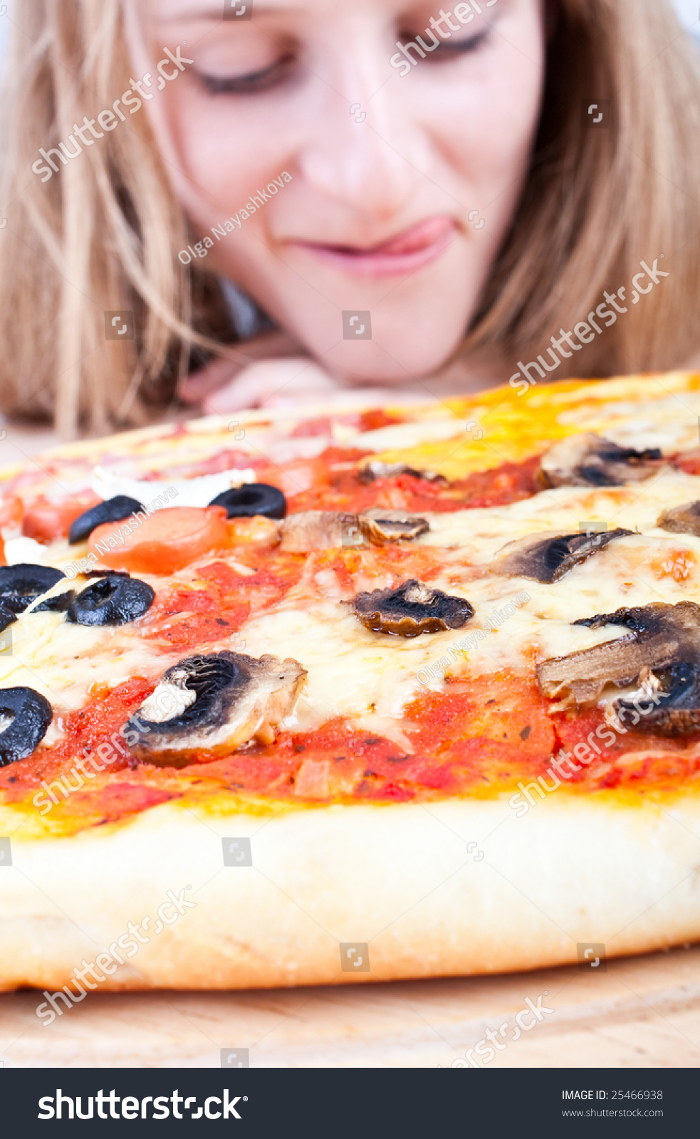 Hungry Young Girl Licking Her Lips In Anticipation In Front Of A ...