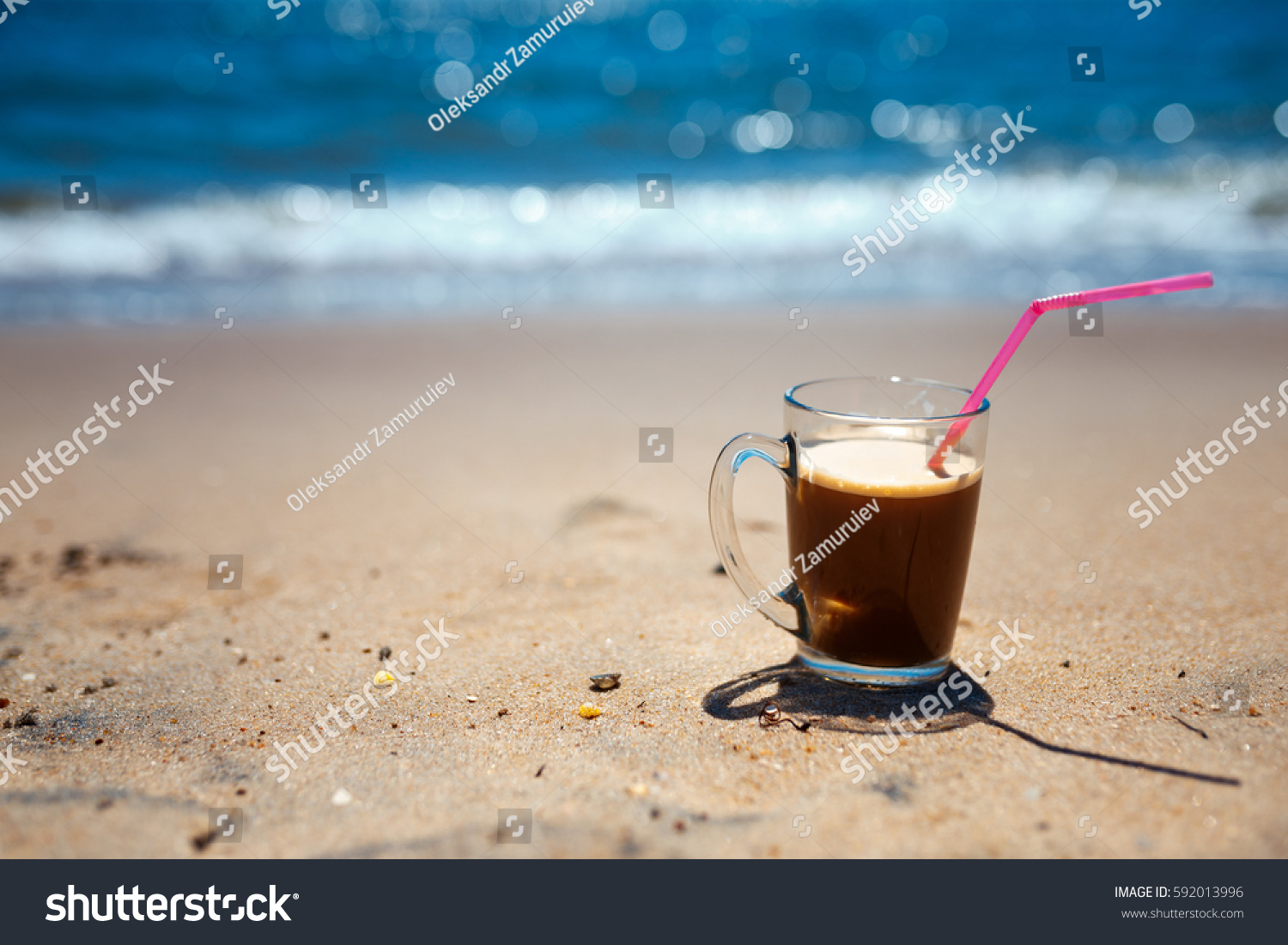 Iced Coffee Latte On Beach Ocean Stock Photo 592013996 - Shutterstock