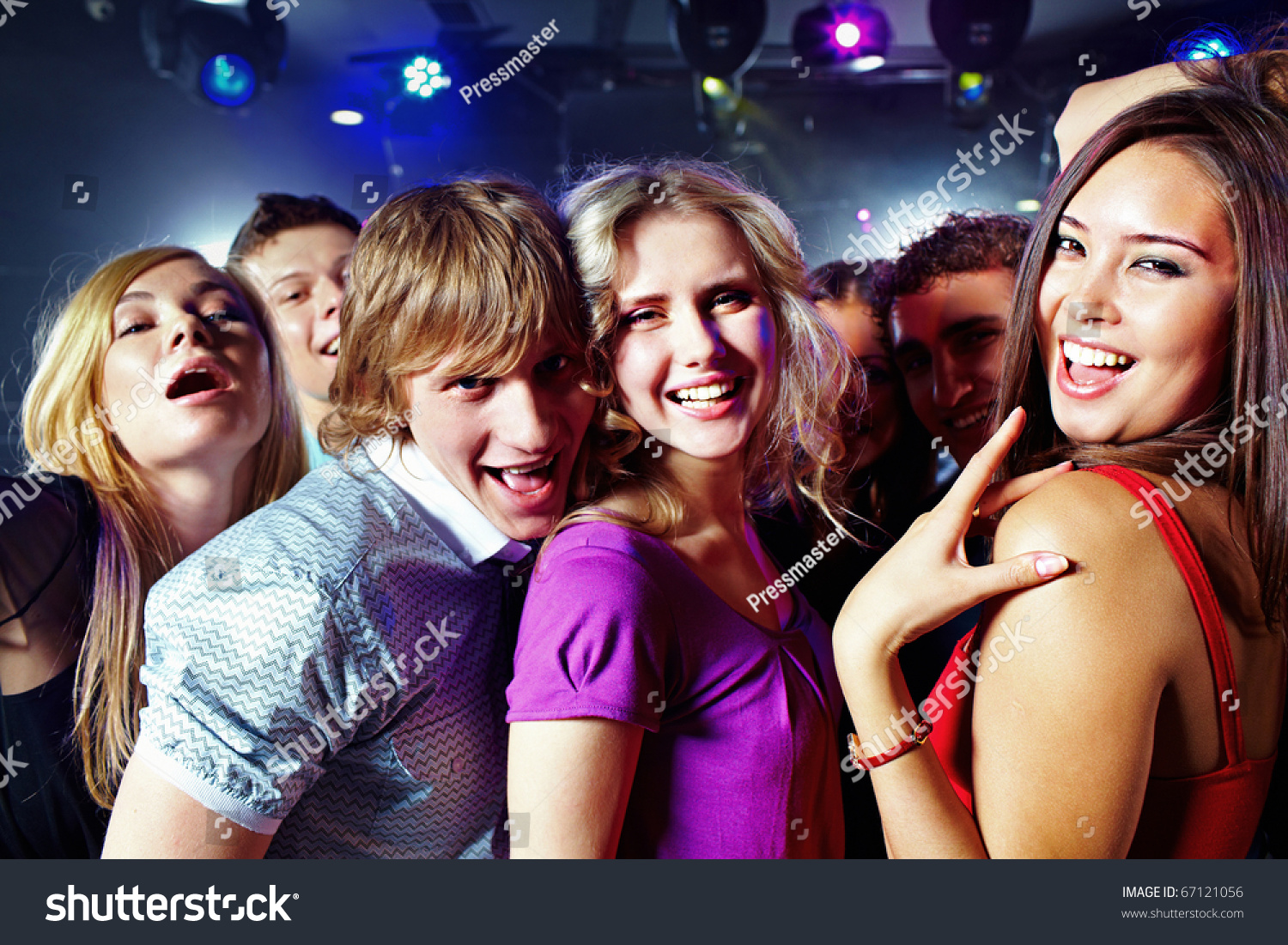 Image Of Clubbing Friends Looking At Camera During Party Stock Photo ...