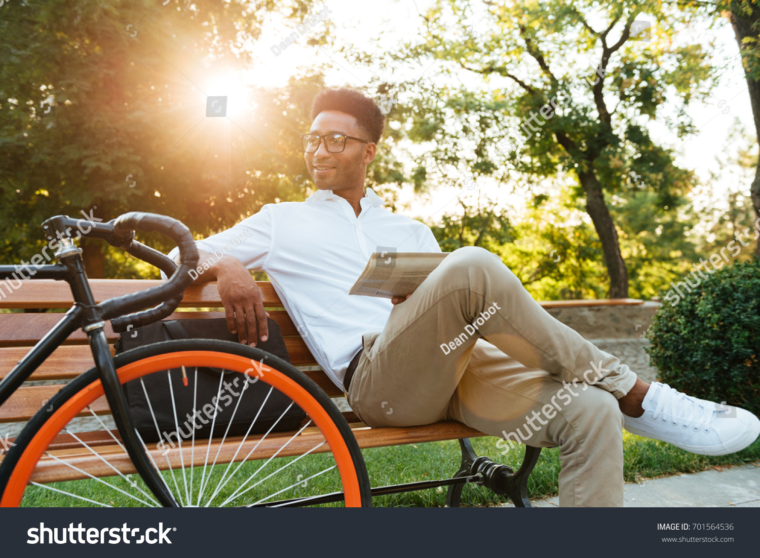  Tawny Brown Classic  Template Design Featuring Image of Concentrated Young African