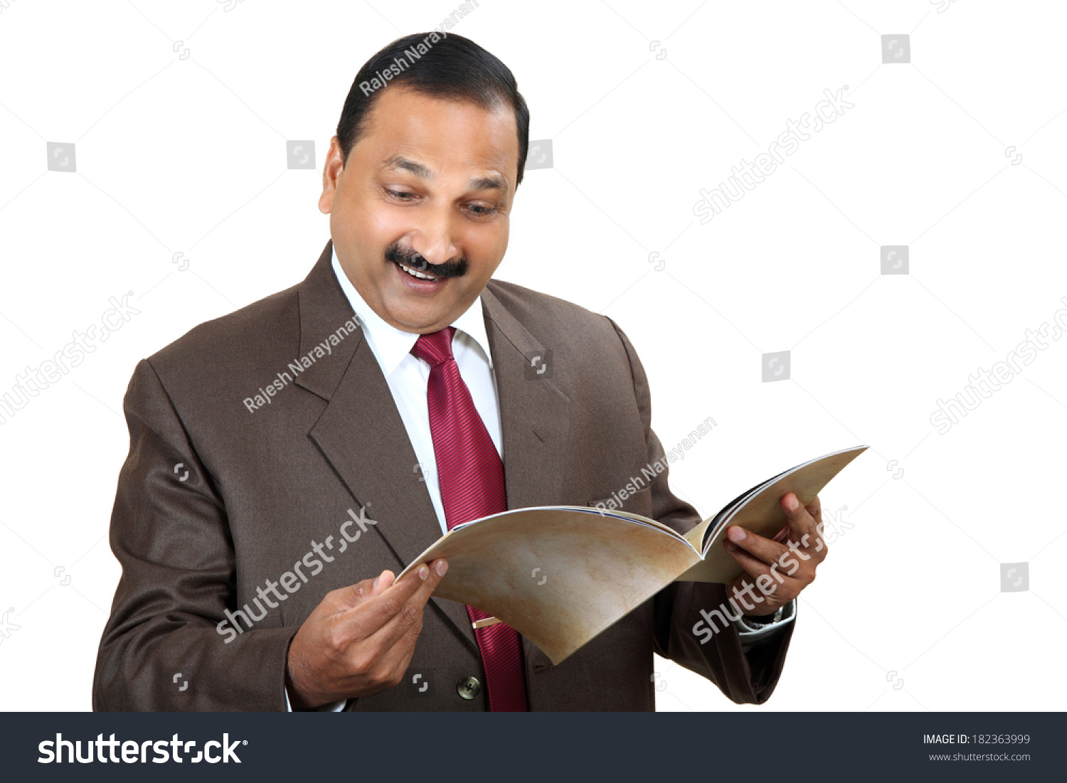 indian man reading book