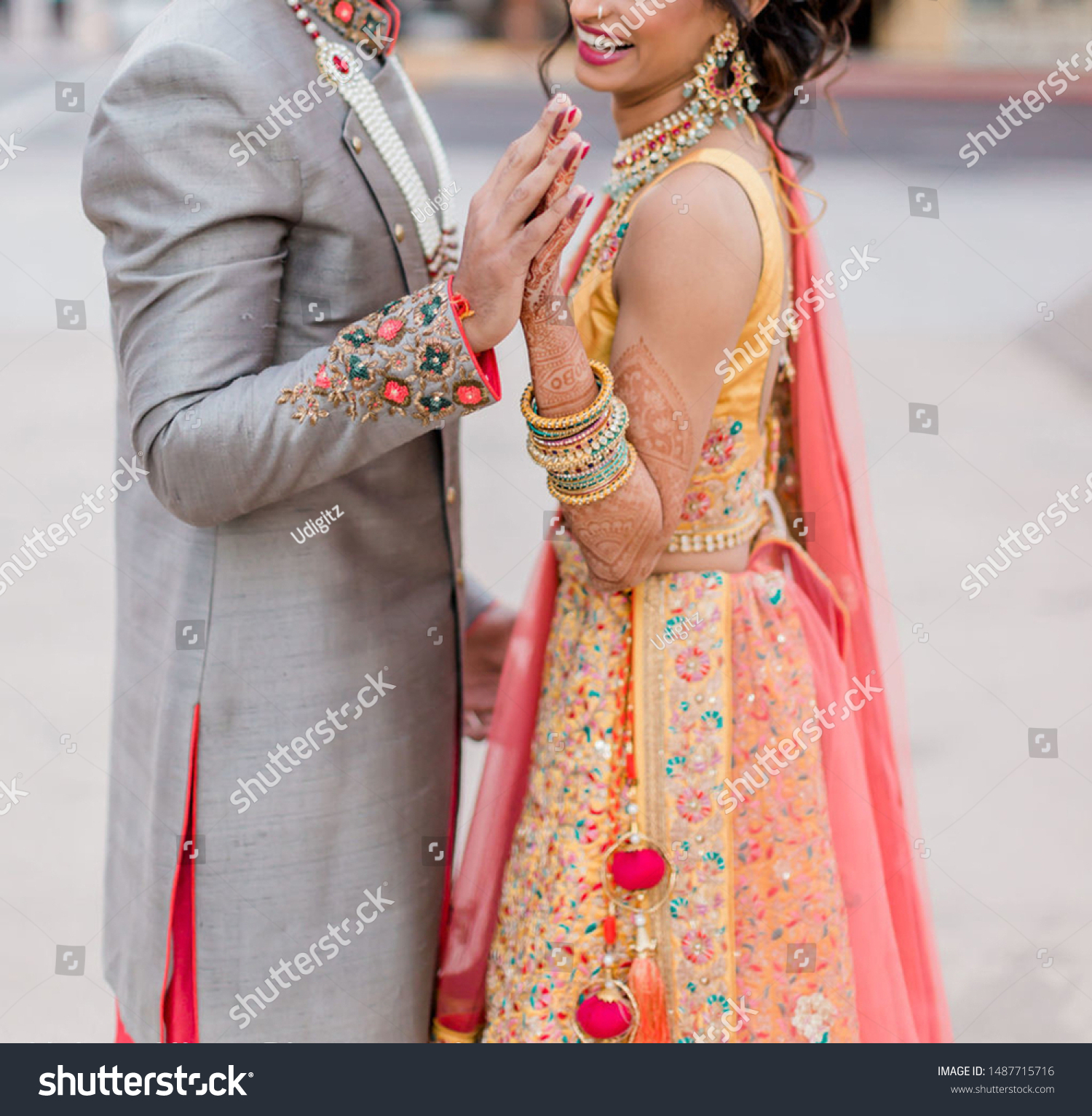 sherwani with pink lehenga