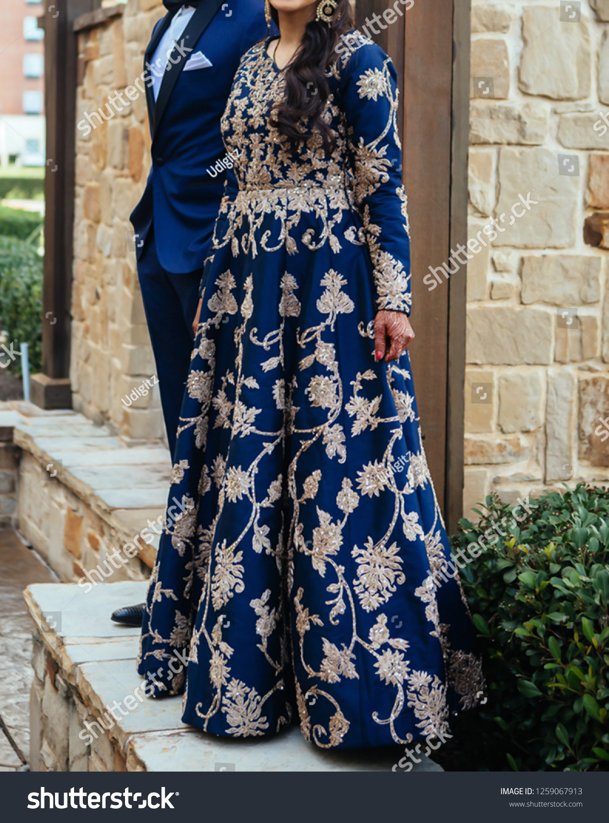 bride and groom blue dress