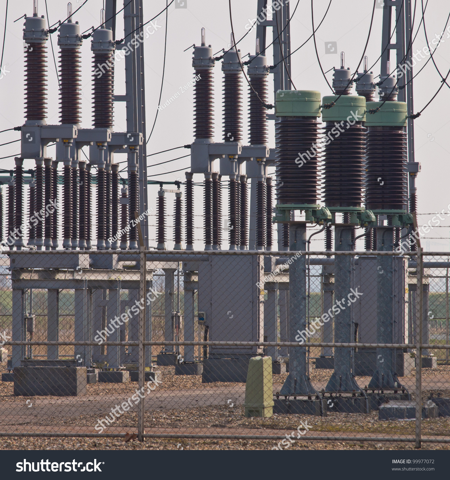 Industrial Ceramic Insulators On High Voltage Stock Photo Edit Now   Stock Photo Industrial Ceramic Insulators On A High Voltage Transformation Site 99977072 