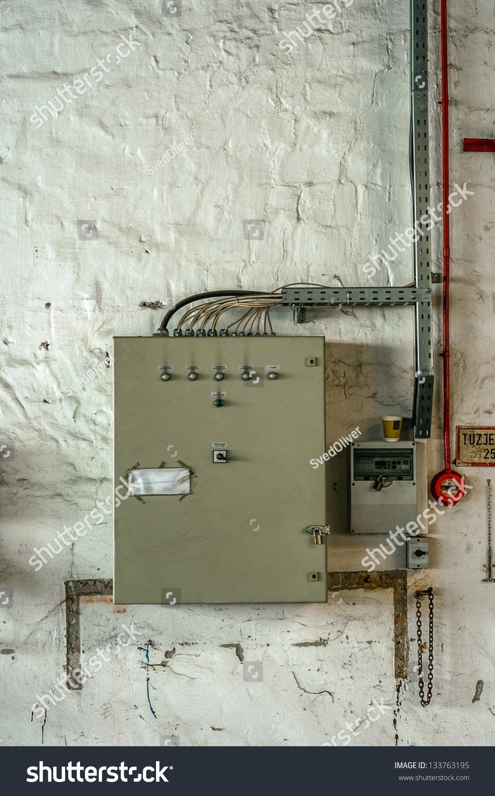 Industrial fuse box on the wall closeup photo