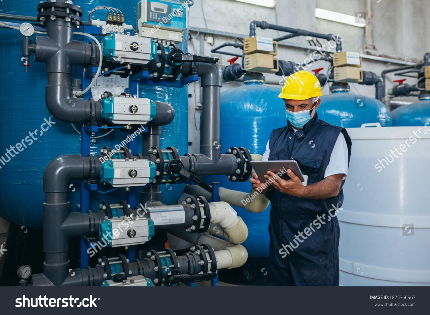 Industry Worker Checking Chemical Water Treatment Stock Photo