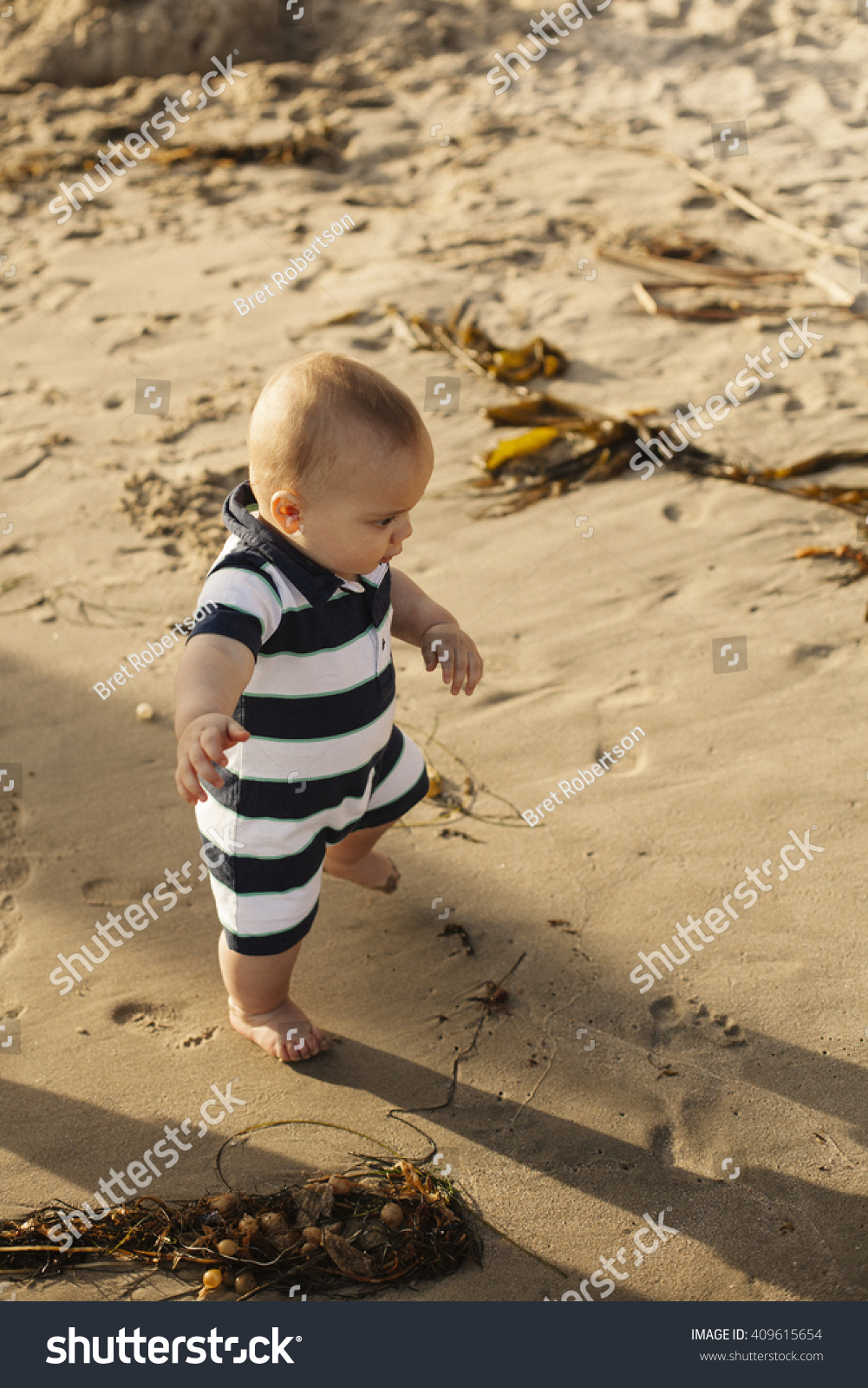 how do babies walk on their own