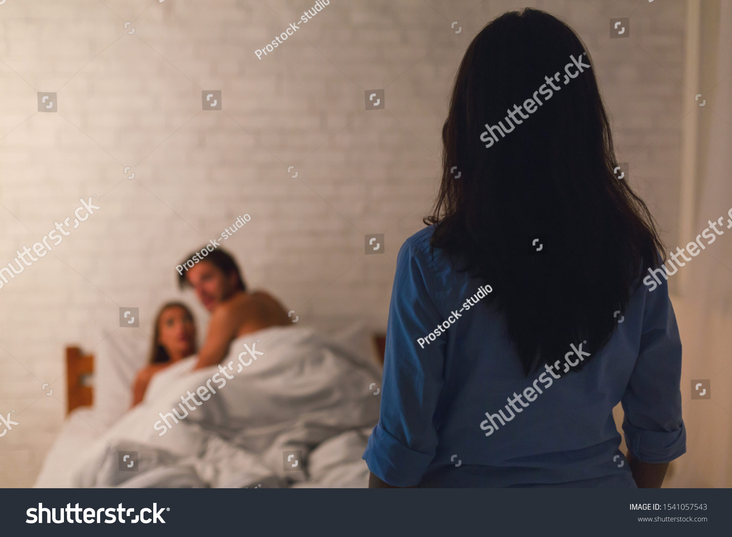 Stock Photo Infidelity Wife Catching Cheating Husband With Mistress In Bed Making Love At Home Selective 1541057543 