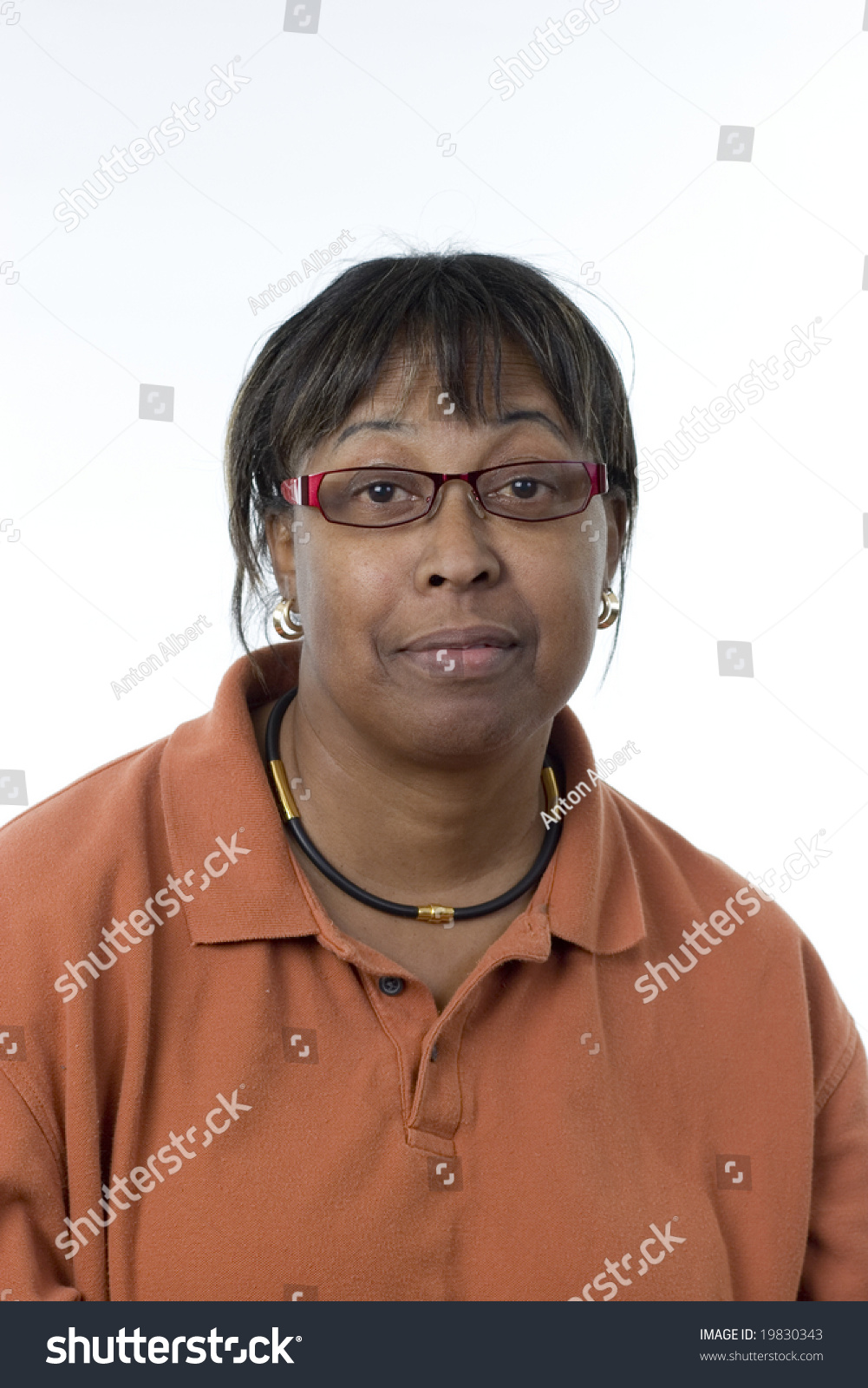 Informal Portrait Of A Black Middle-Aged Woman Slightly Smiling Wearing ...