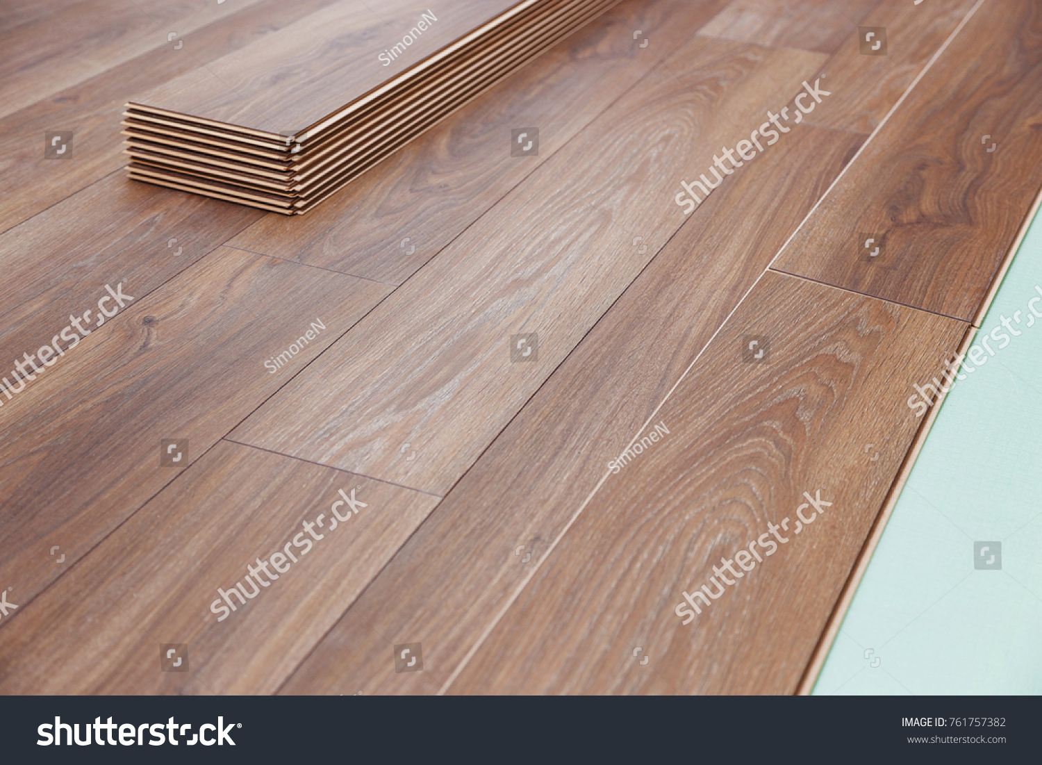 Installing Wooden Laminate Flooring Soundproofing Sheets Stock Photo Installing Wooden Laminate Flooring With Soundproofing Sheets Laying