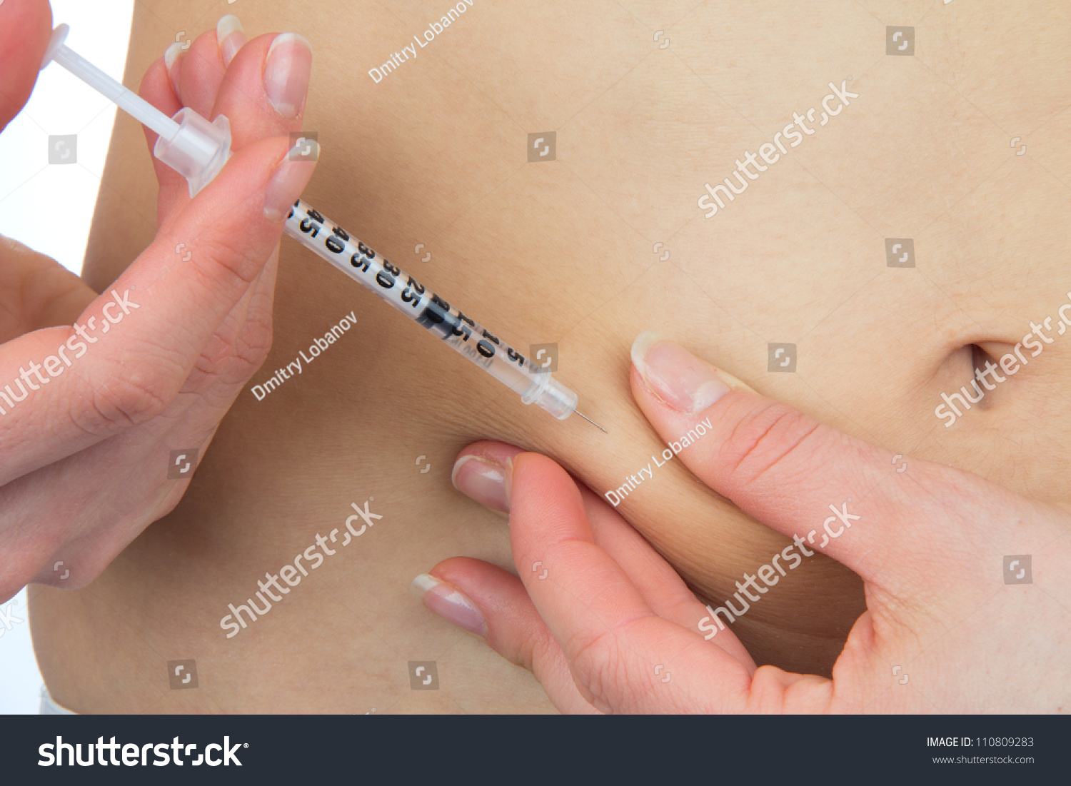 Insulin Diabetes patient make a subcutaneous injection by single use syringe with needle and Rapid-acting humalog insulin into abdomen by doctor prescription isolated on a white background