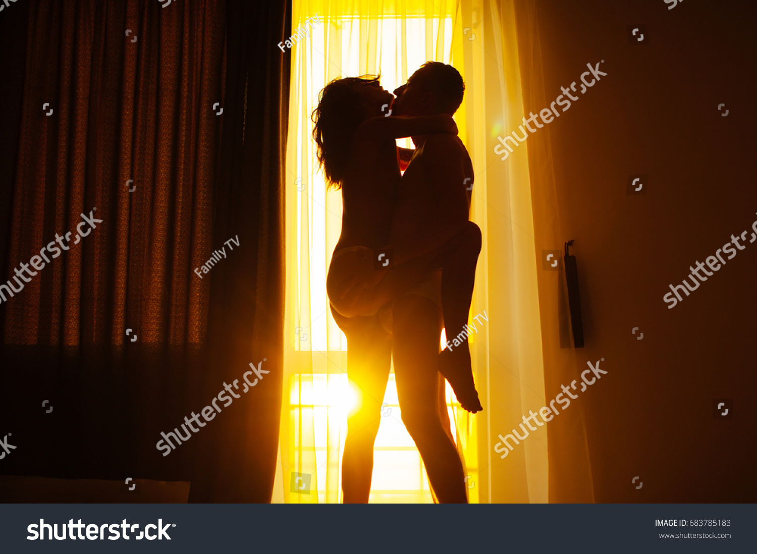 very nice young couple fucking in front of the window