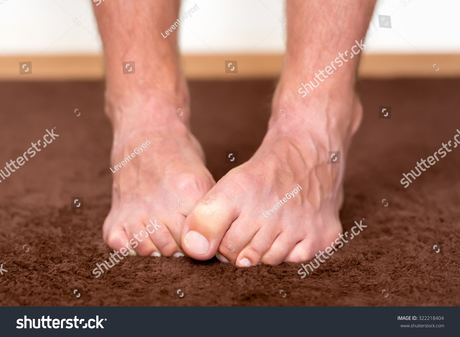 itchy-cold-feet-resting-on-the-floor-stock-photo-322218404-shutterstock