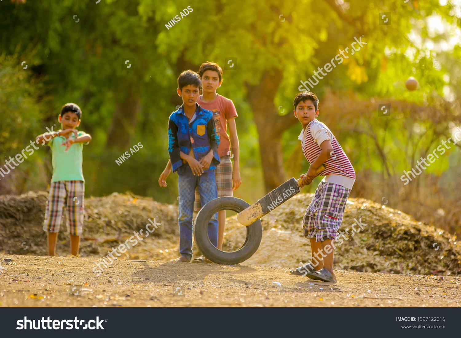 657 Indian child playing cricket Images, Stock Photos & Vectors ...