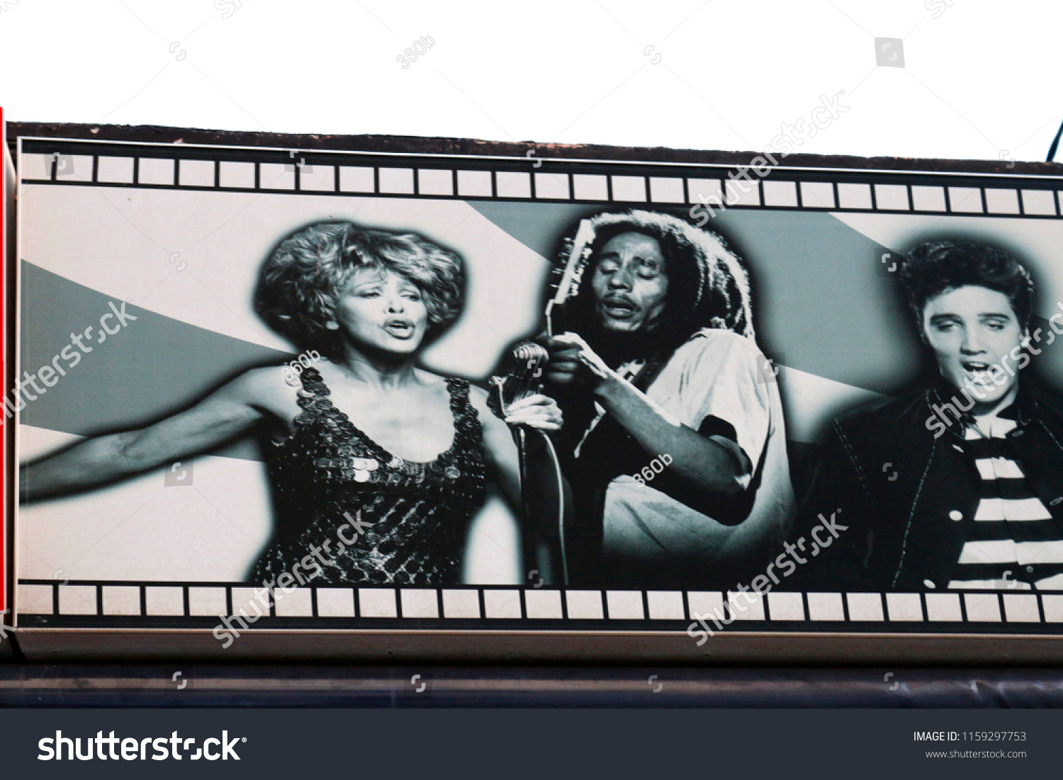 Tina Turner, Bob Marley, Elvis Presley on a billboard