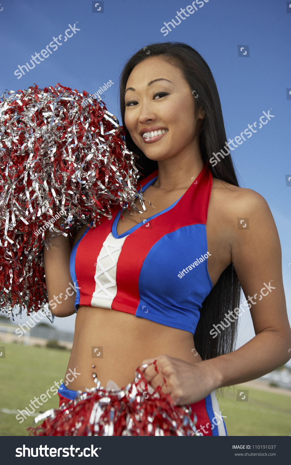 stock-photo-japanese-cheerleader-holding-pompoms-110191037.jpg