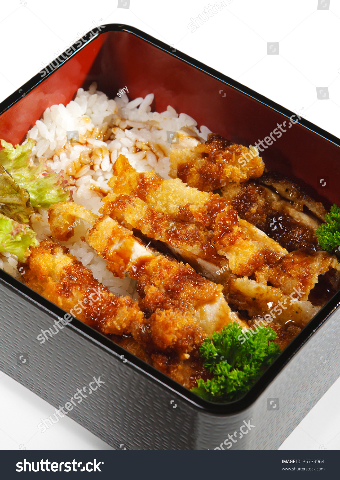 Japanese Cuisine - Fried Pork Meat With Rice And Parsley Stock Photo