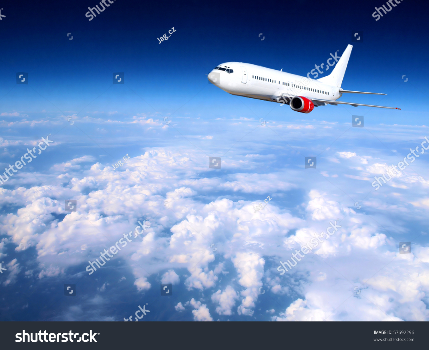 Jet Plane Above Clouds Stock Photo 57692296 | Shutterstock