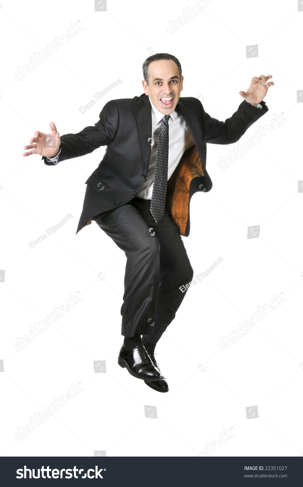 Jumping Businessman In A Suit Isolated On White Background Stock Photo ...
