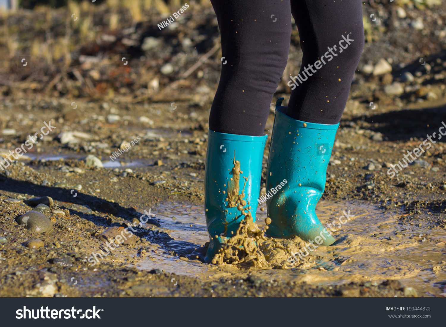 Jumping Muddy Puddle Colored Gumboots Stock Photo 199444322 - Shutterstock