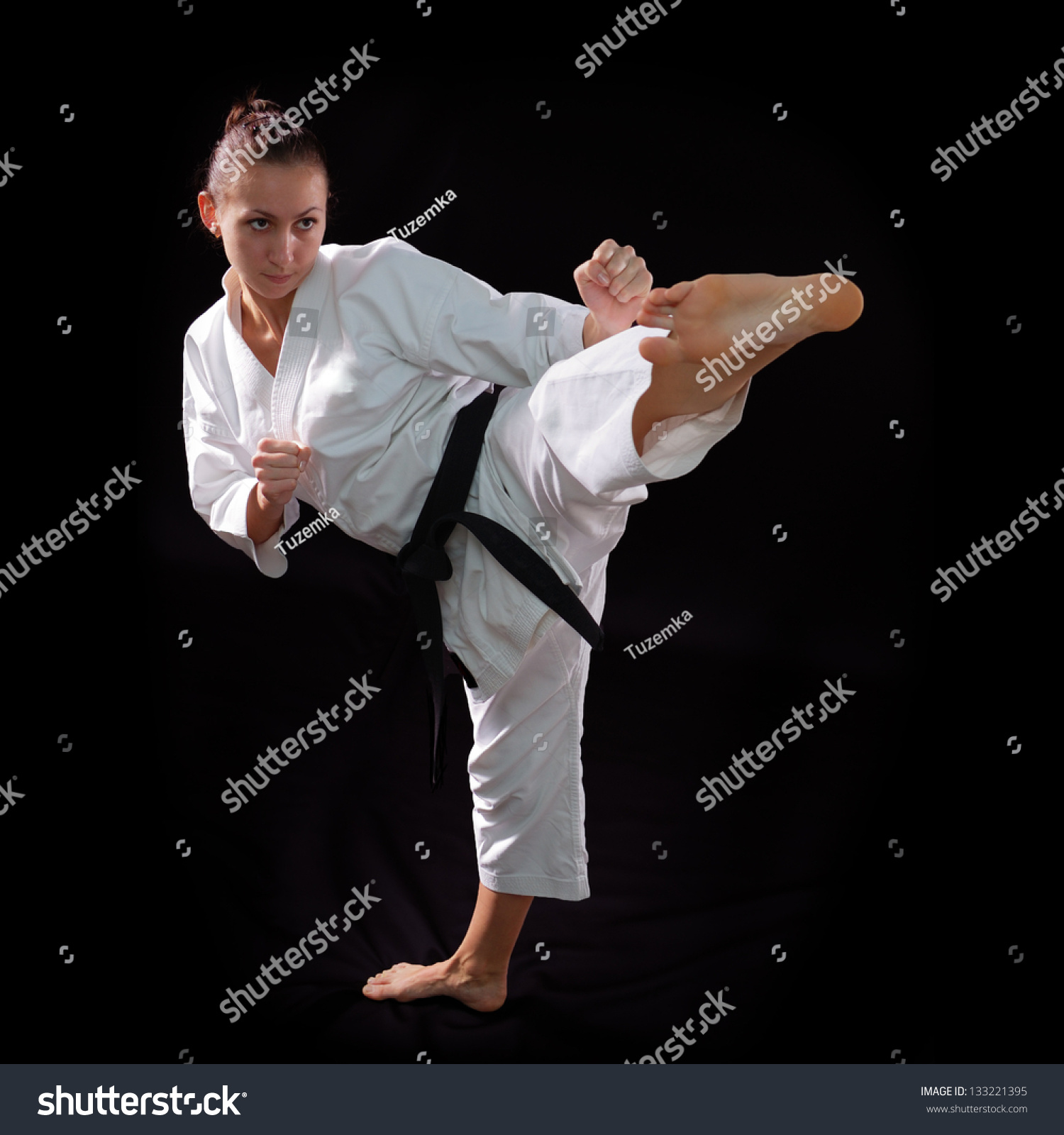 Karate Girl With Black Belt Posing, Champion Of The World, On Black ...