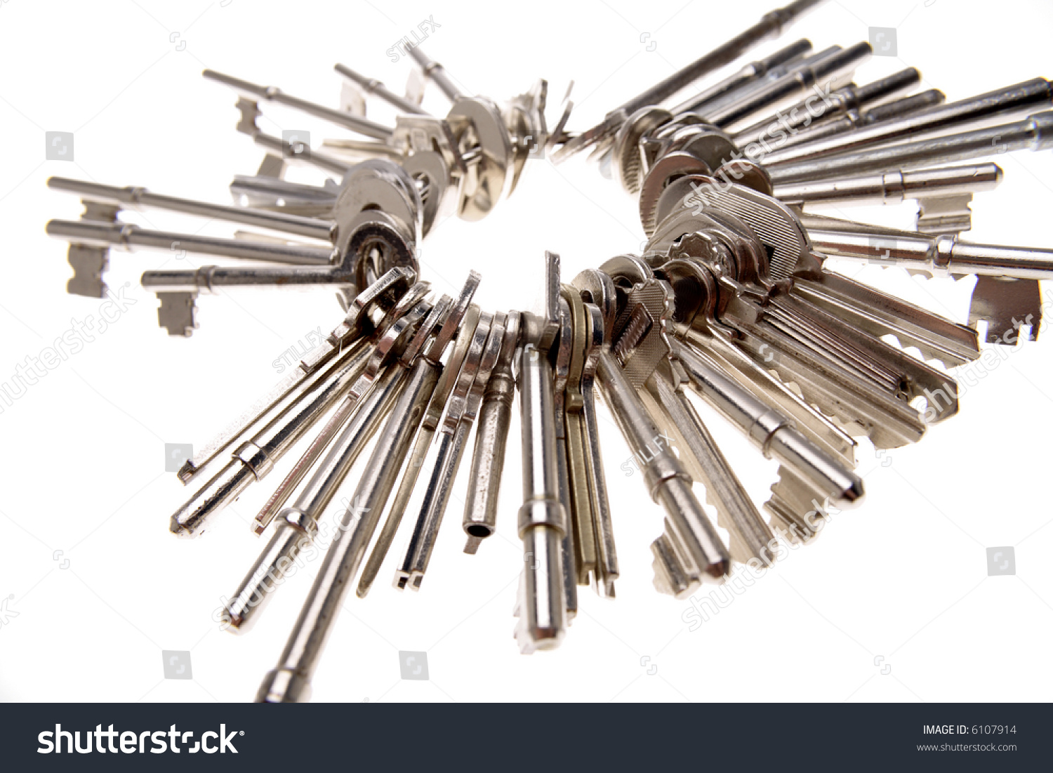 https://image.shutterstock.com/z/stock-photo-keys-on-keyring-over-white-6107914.jpg