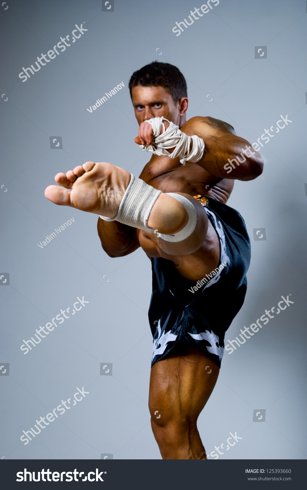 Kickboxer Kicks On Gray Background Martial Stock Photo 125393660 ...