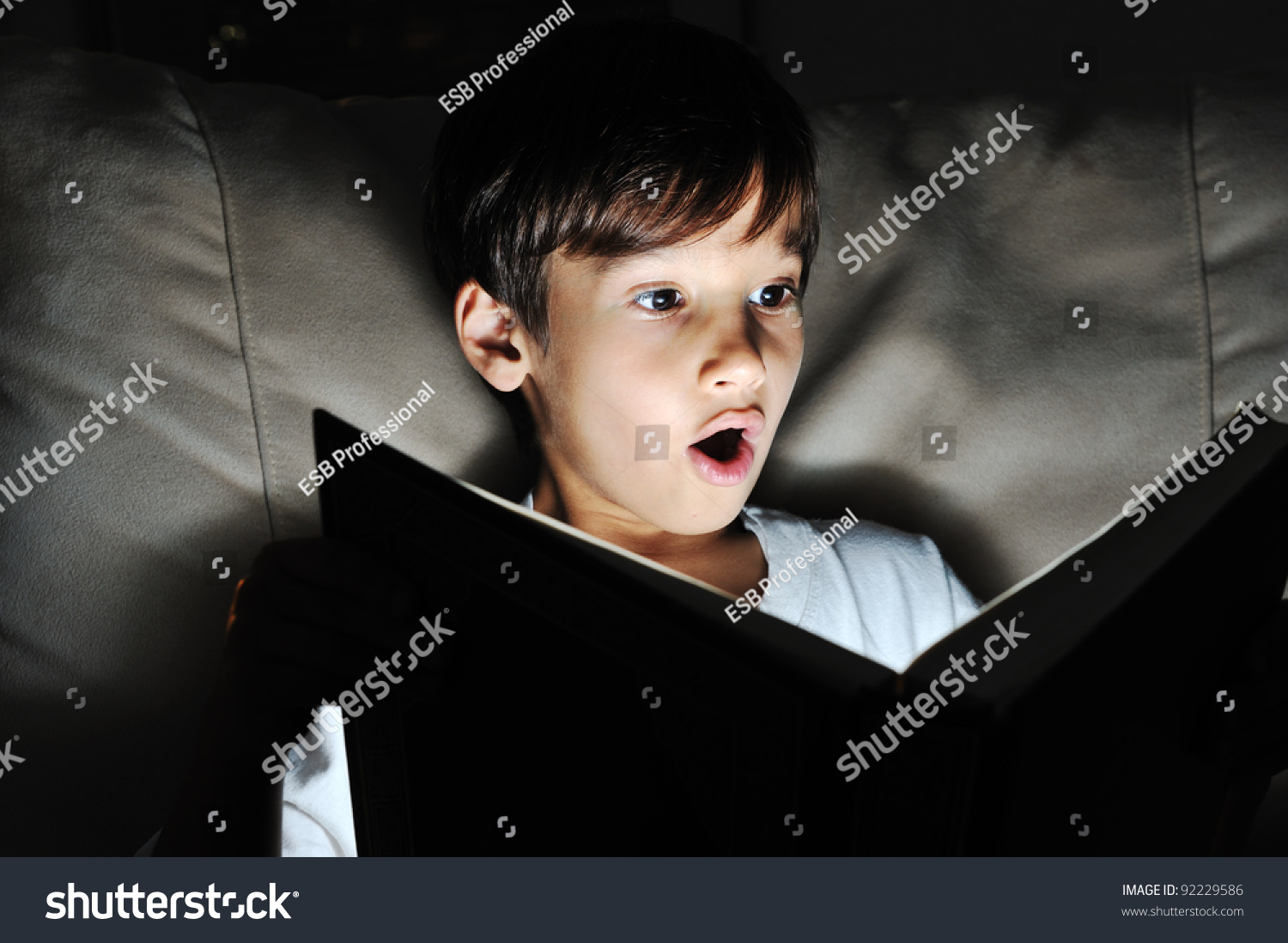 Kid Reading Book, Light In Darkness Stock Photo 92229586 : Shutterstock