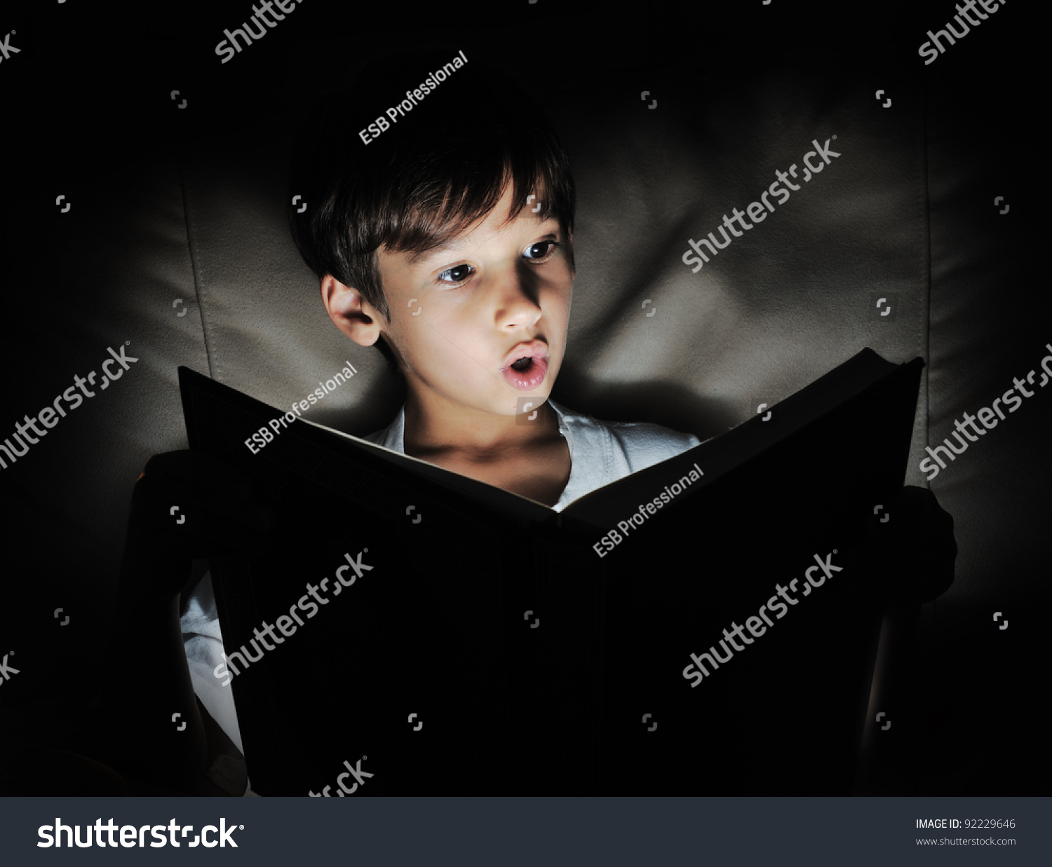 Kid Reading Book, Light In Darkness Stock Photo 92229646 : Shutterstock