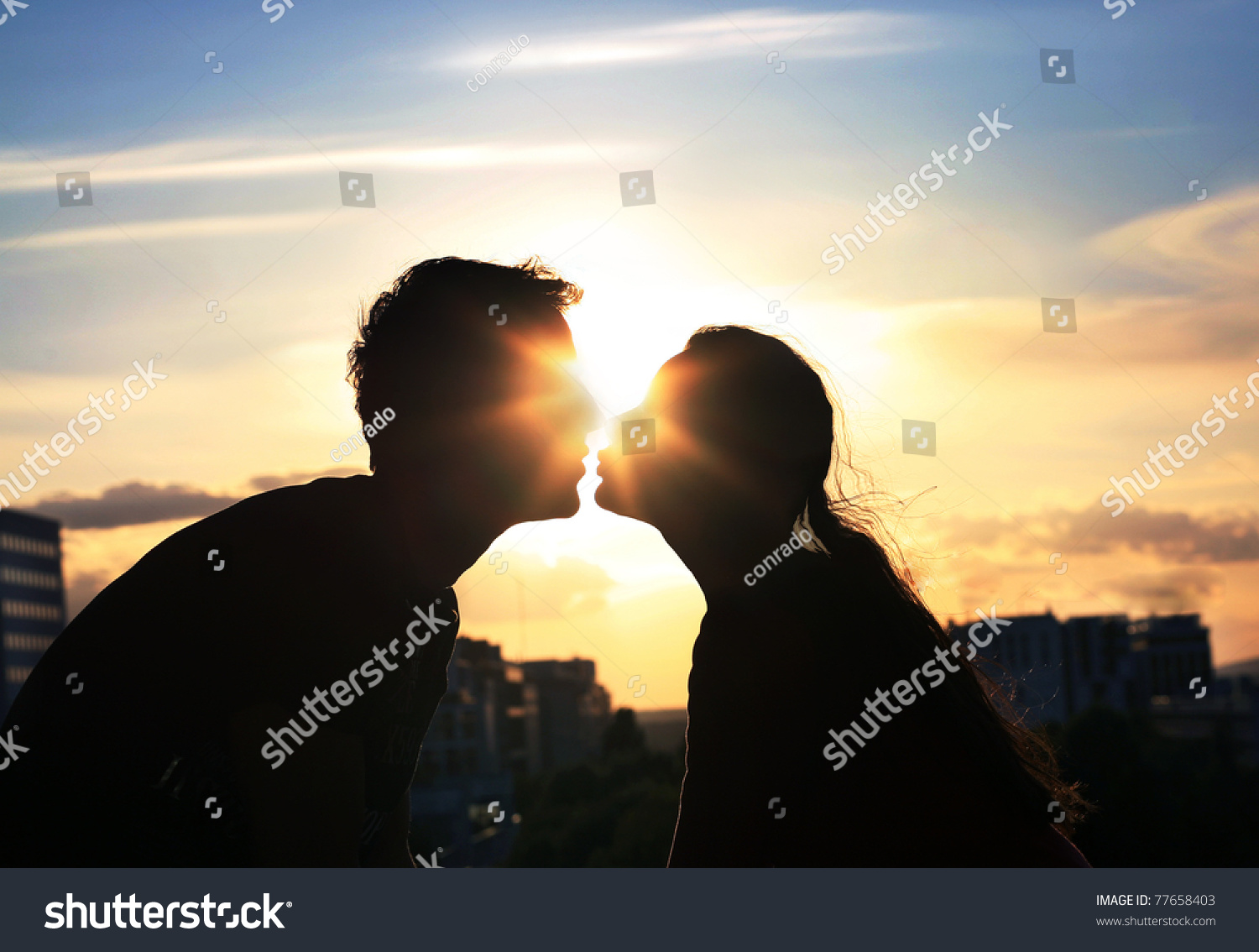 Kissing Couple Over Evening City Background Stock Photo 77658403