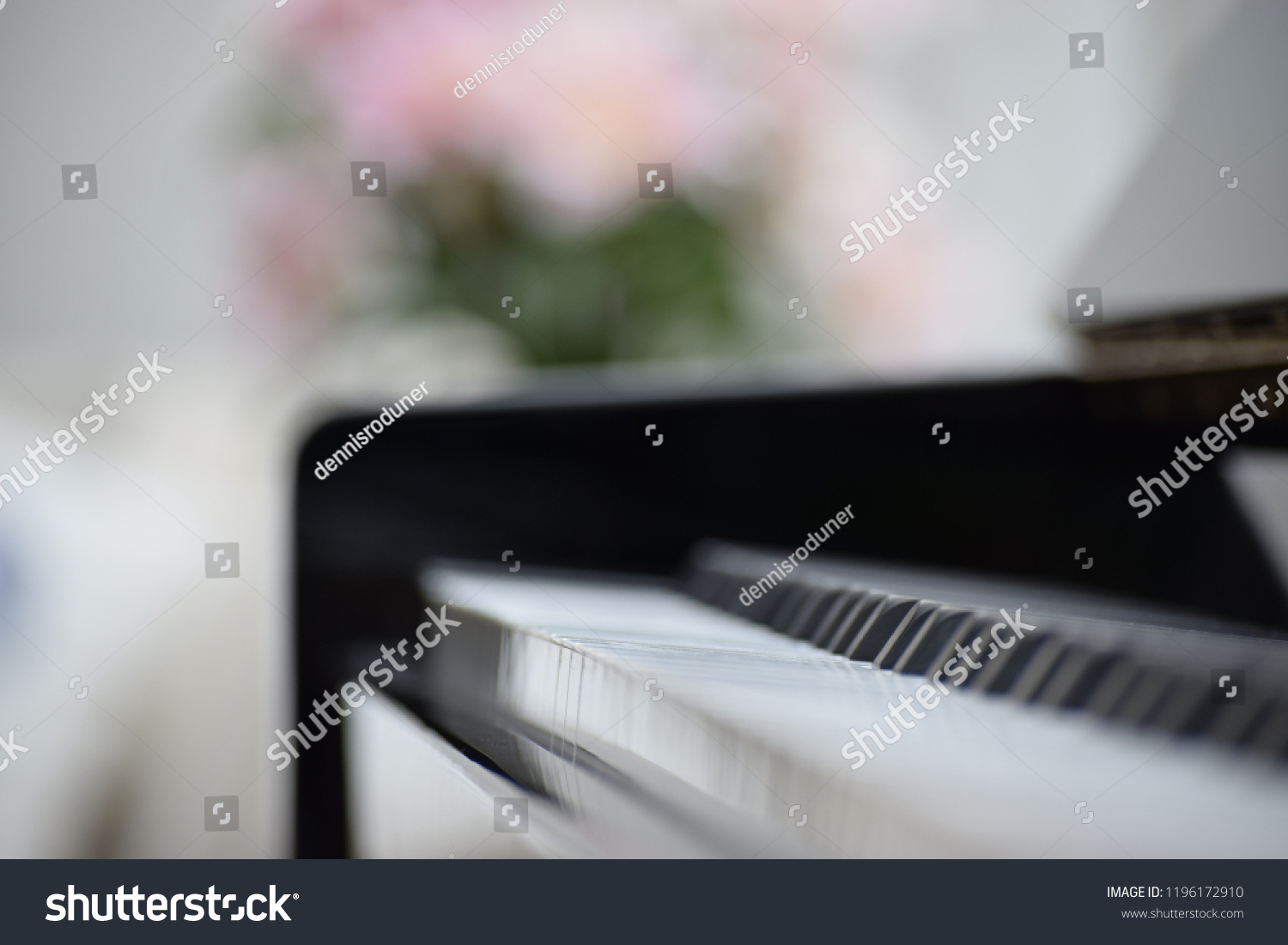 Klaviertastatur Mit Blume Im Hintergrund Stock Photo Edit Now