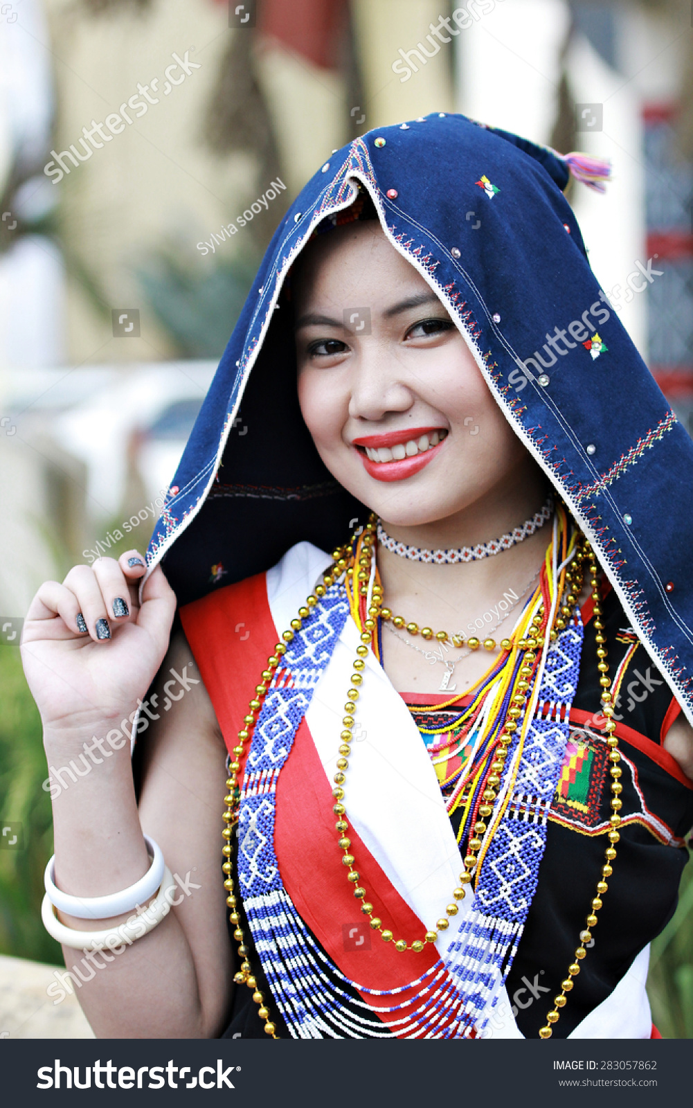 Kota Kinabalu, Malaysia - May 30, 2015: A Beautiful Dusun Tobilung Lady ...