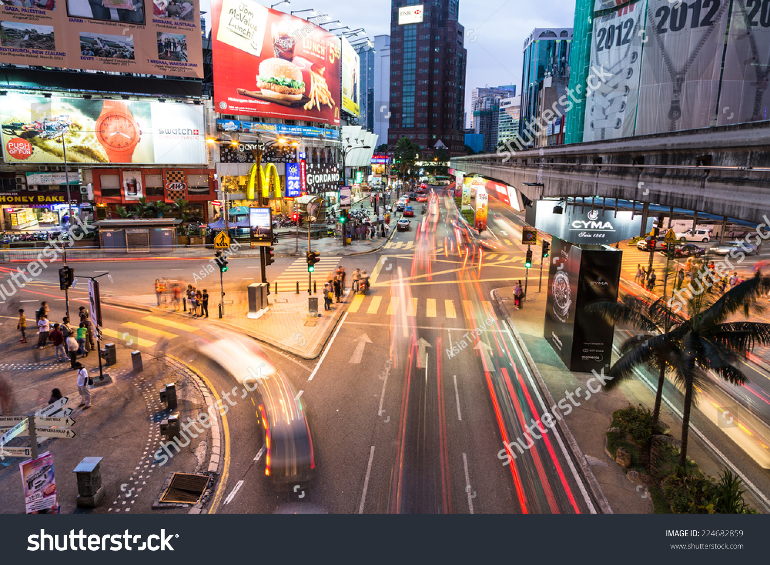 Kuala Lumpur, Malaysia - July 10 2012: Cars Rush At Night Through The ...