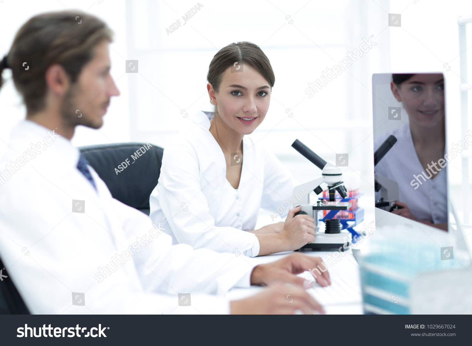  Sky Blue Classic  Template Design Featuring Lab Expert Working on a Test Using Microscope