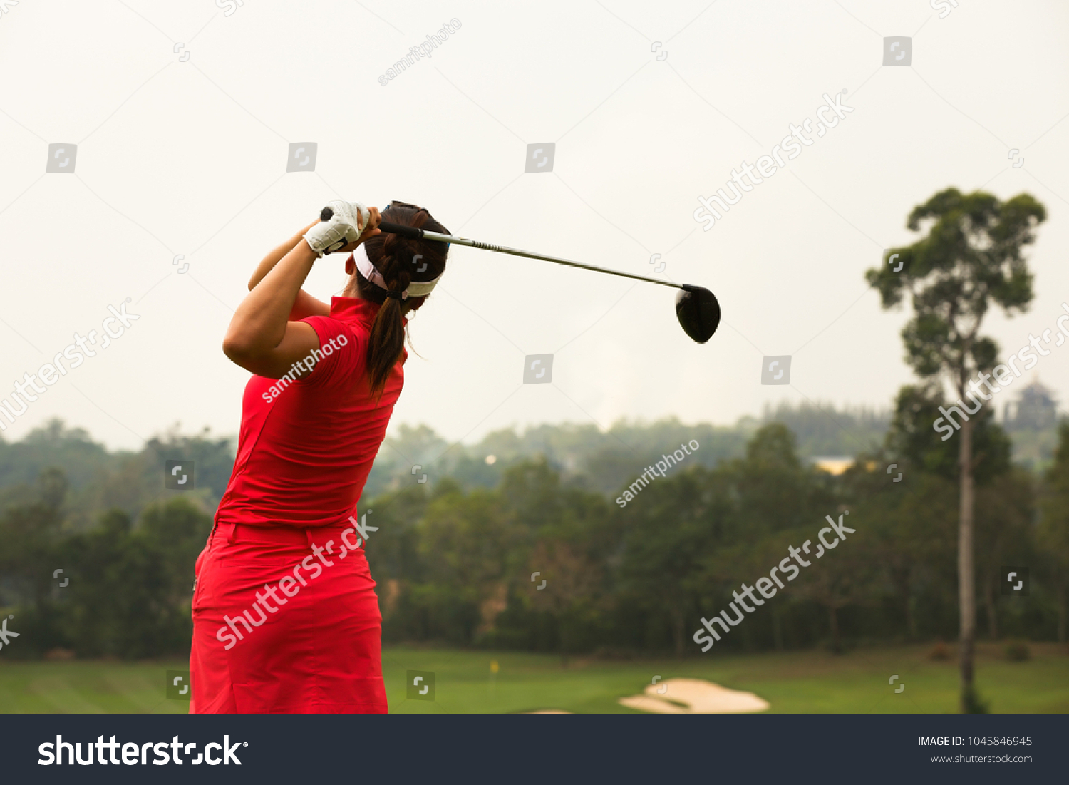 Ladies Golfer Finished Golf Swing Driver Stock Photo (Edit Now)