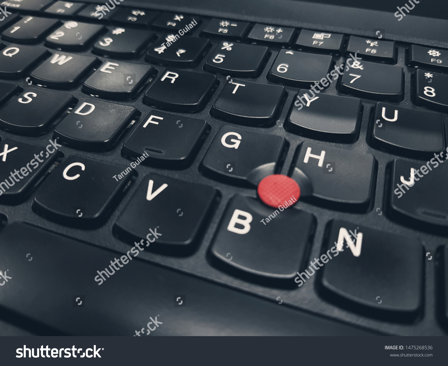 laptop-keyboard-red-dot-middle-stock-photo-1475268536-shutterstock