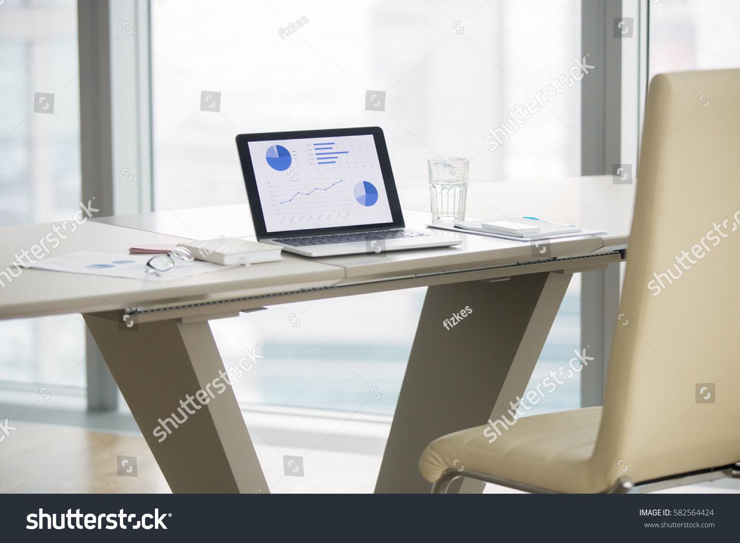 laptop graphs on screen on white stock photo 582564424 - shutterstock laptop graphs on screen on white stock photo 582564424 - shutterstock