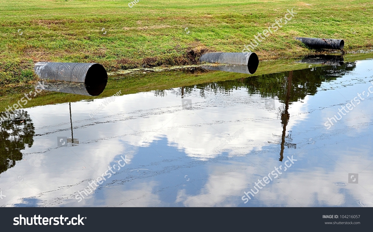 Large Sewerage Pipes Dumping Into Waterway Stock Photo 104216057 ...