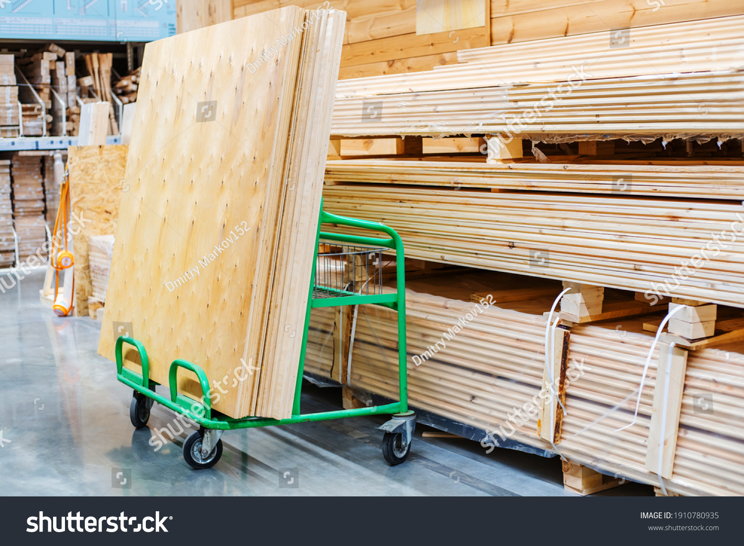 Shutterstock   Stock Photo Large Sheets Of Plywood Lie On A Transport Cart In A Building Supplies Store Copy Space 1910780935 