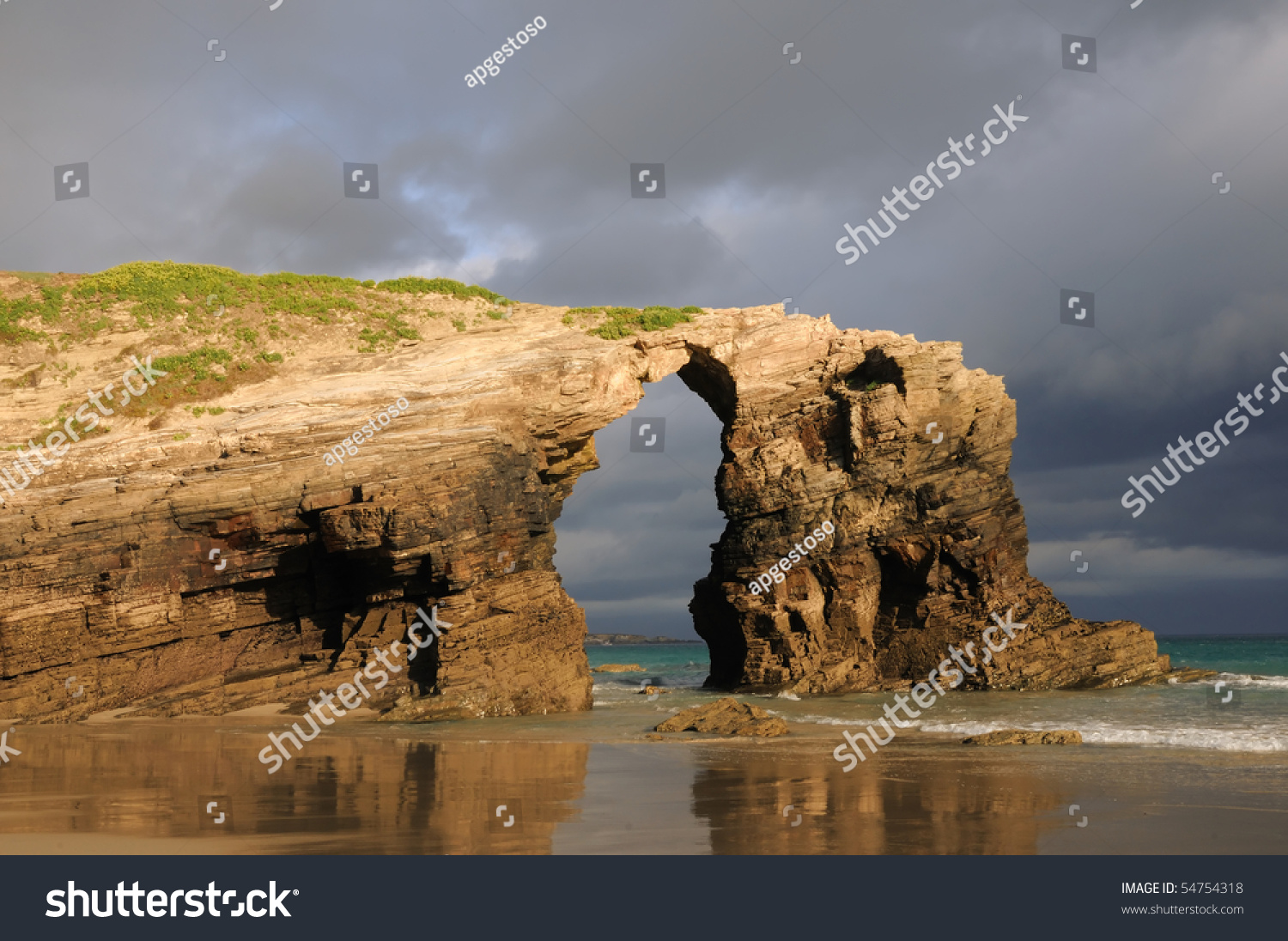 Las Catedrales Beach. Ribadeo, Spain. Last Ray Of Sun In The Early ...