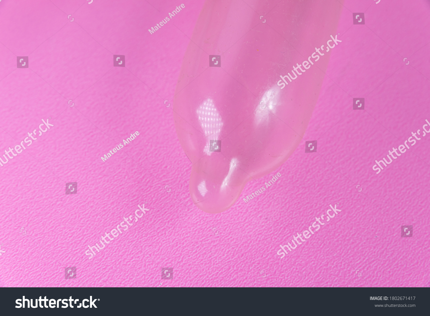 Latex Condom On Pink Background Stock Photo (Edit Now) 1802671417