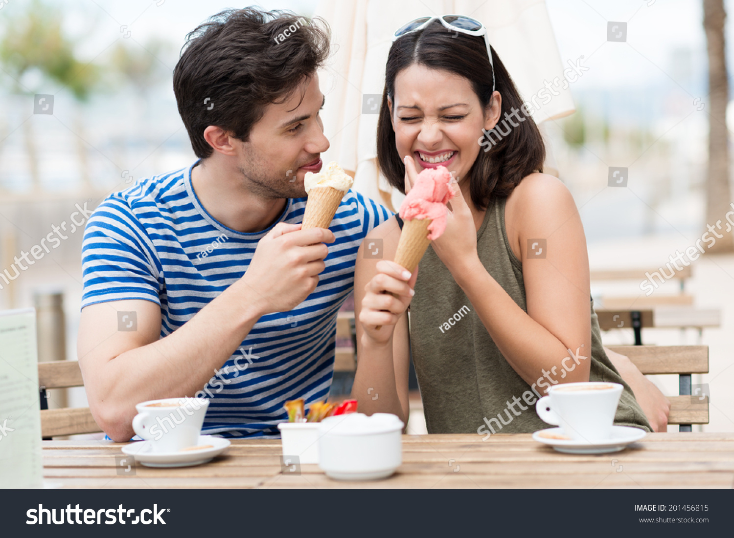 Laughing Couple Eating Ice Cream Cones Stock Photo 201456815 | Shutterstock