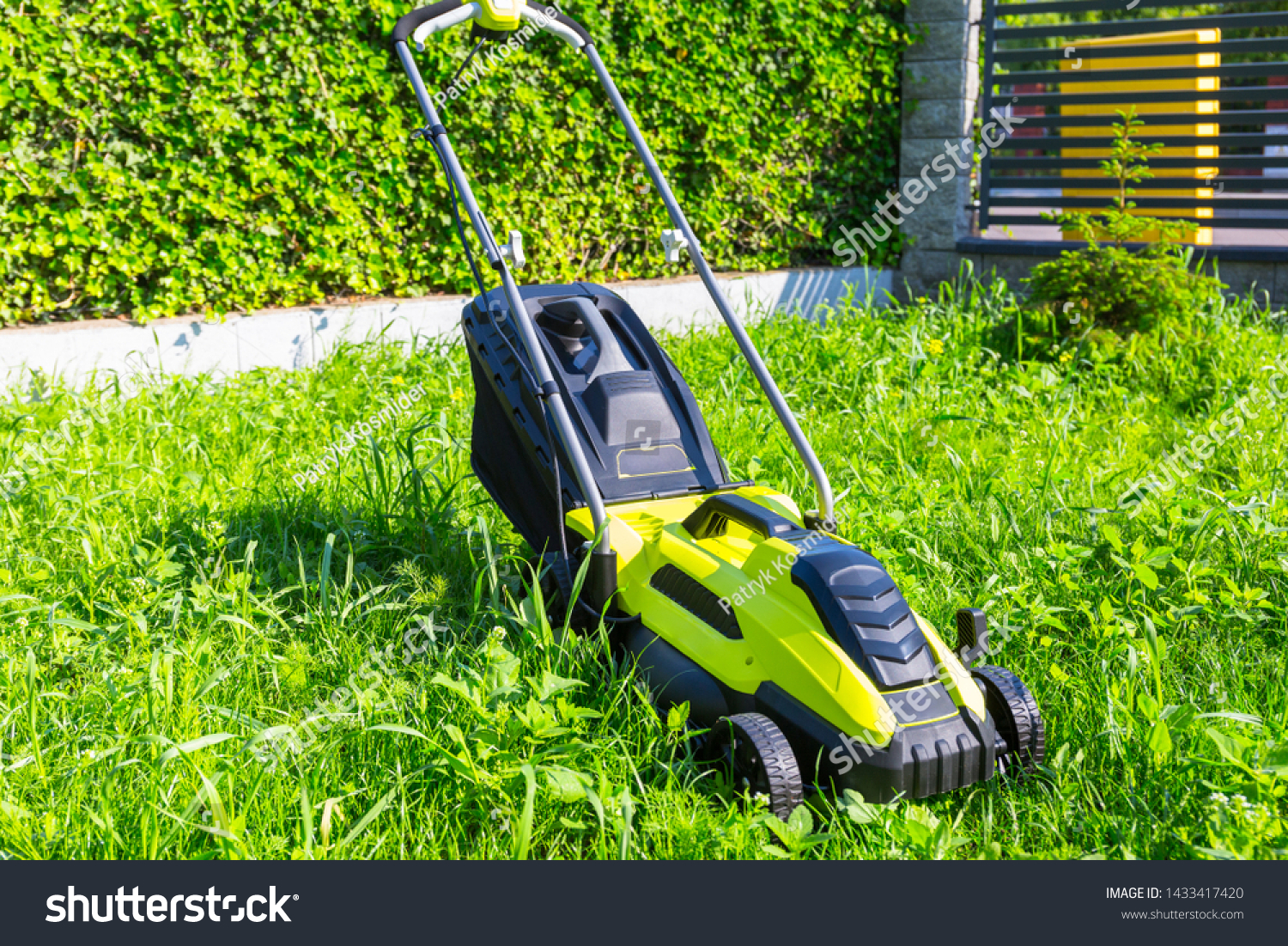 how was grass cut before lawn mowers