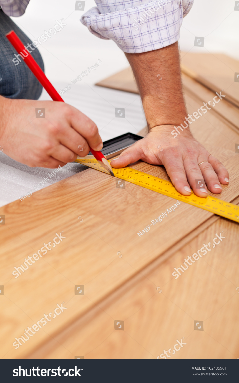 Laying Laminate Flooring Planks Measuring Closeup Stock Photo Safe Laying Laminate Flooring Planks The Measuring Closeup