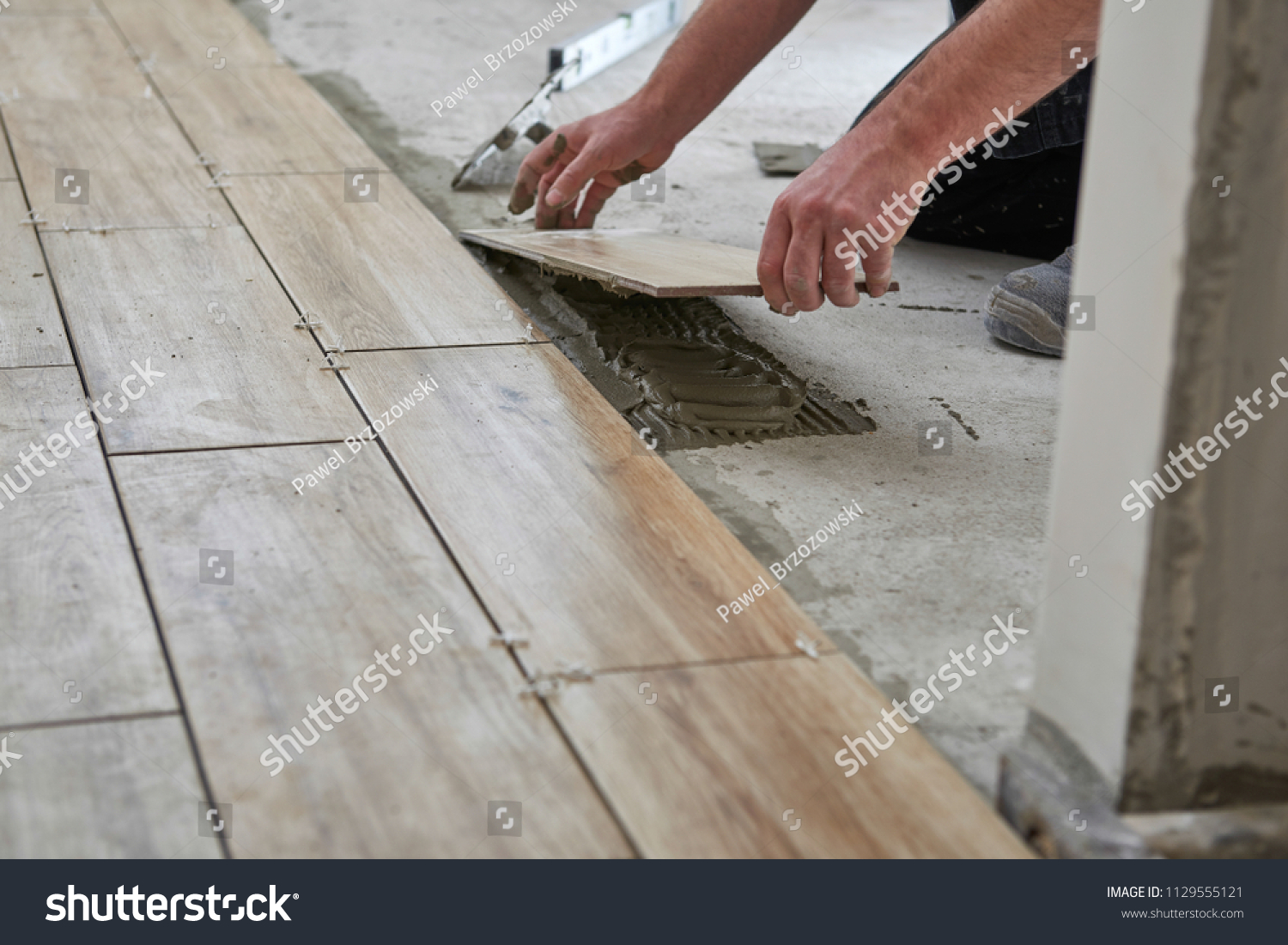 Laying Wood Effect Tiles On Floor Stock Photo Edit Now